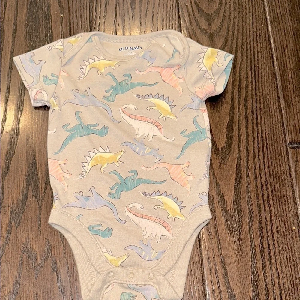Old Navy one piece with Playful Dinosaur Print size 6-12 months